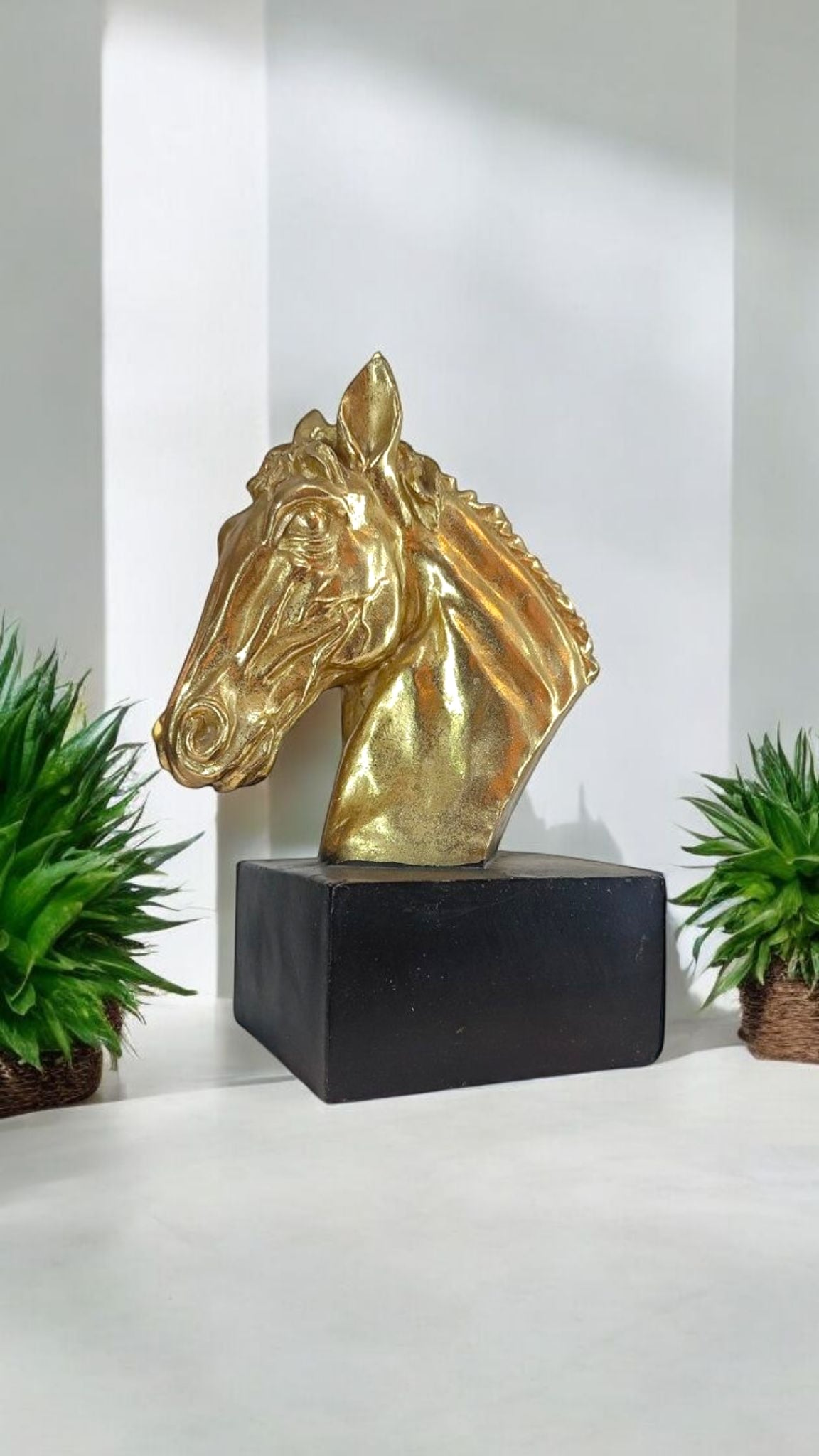 Elegant Golden Horse Head Sculpture on Black Base