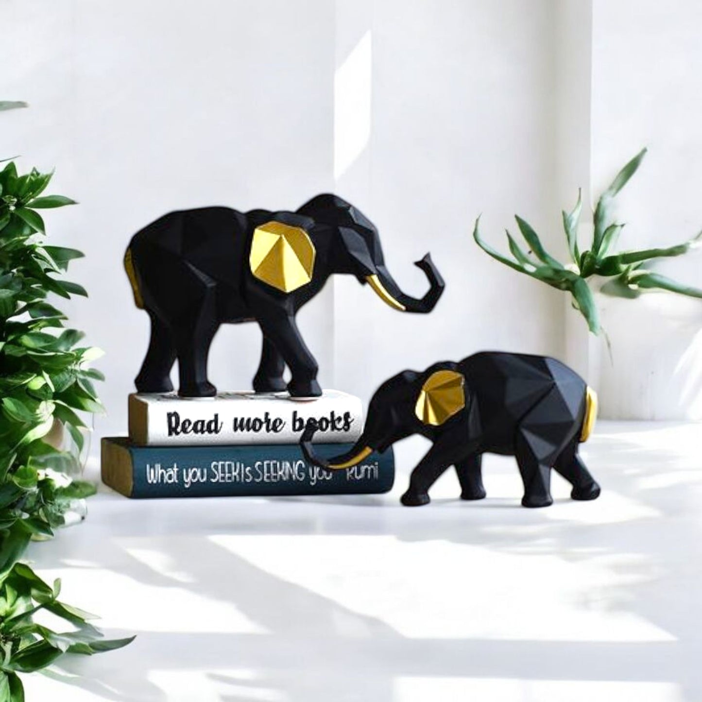 Black and Gold Elephant Figurines