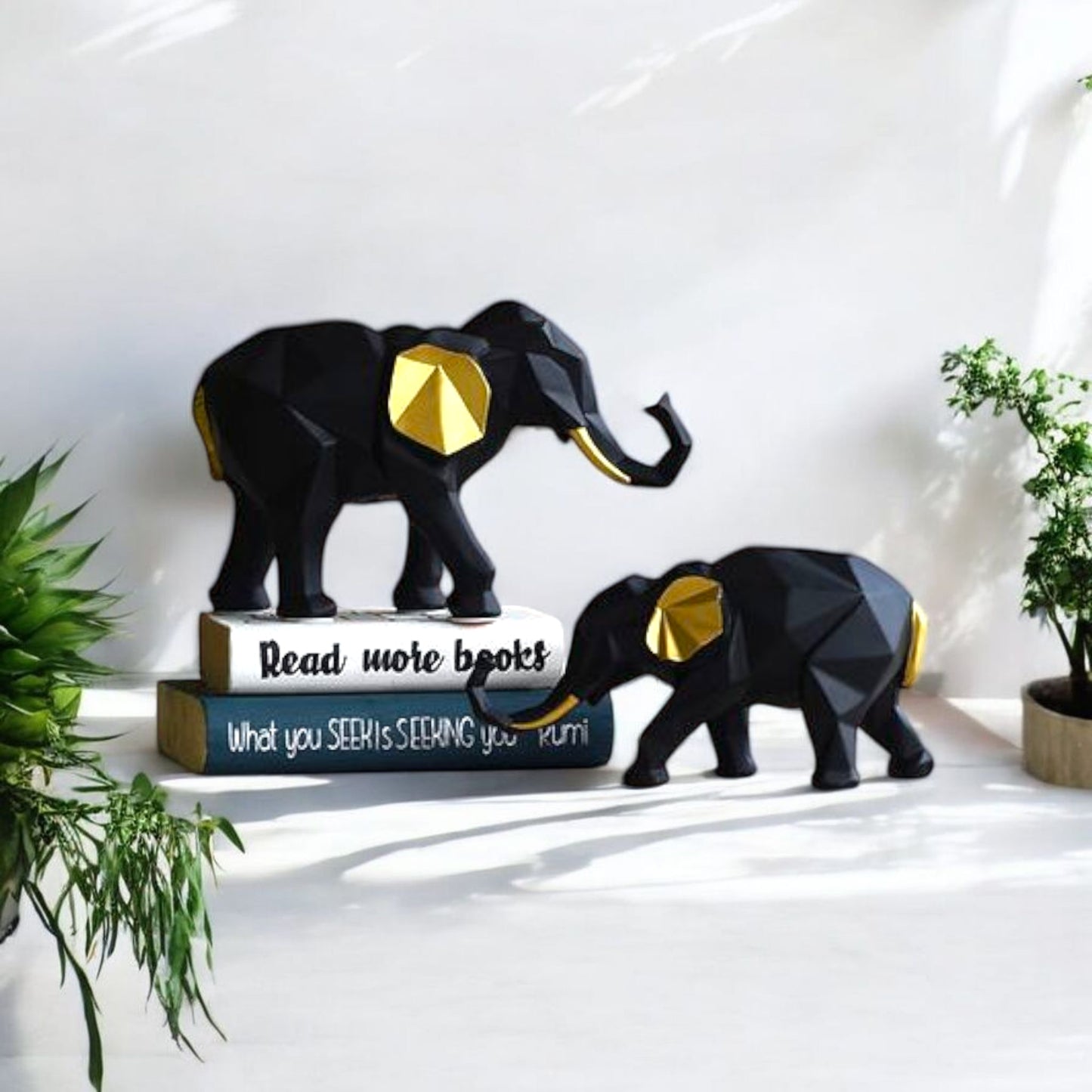 Black and Gold Elephant Figurines