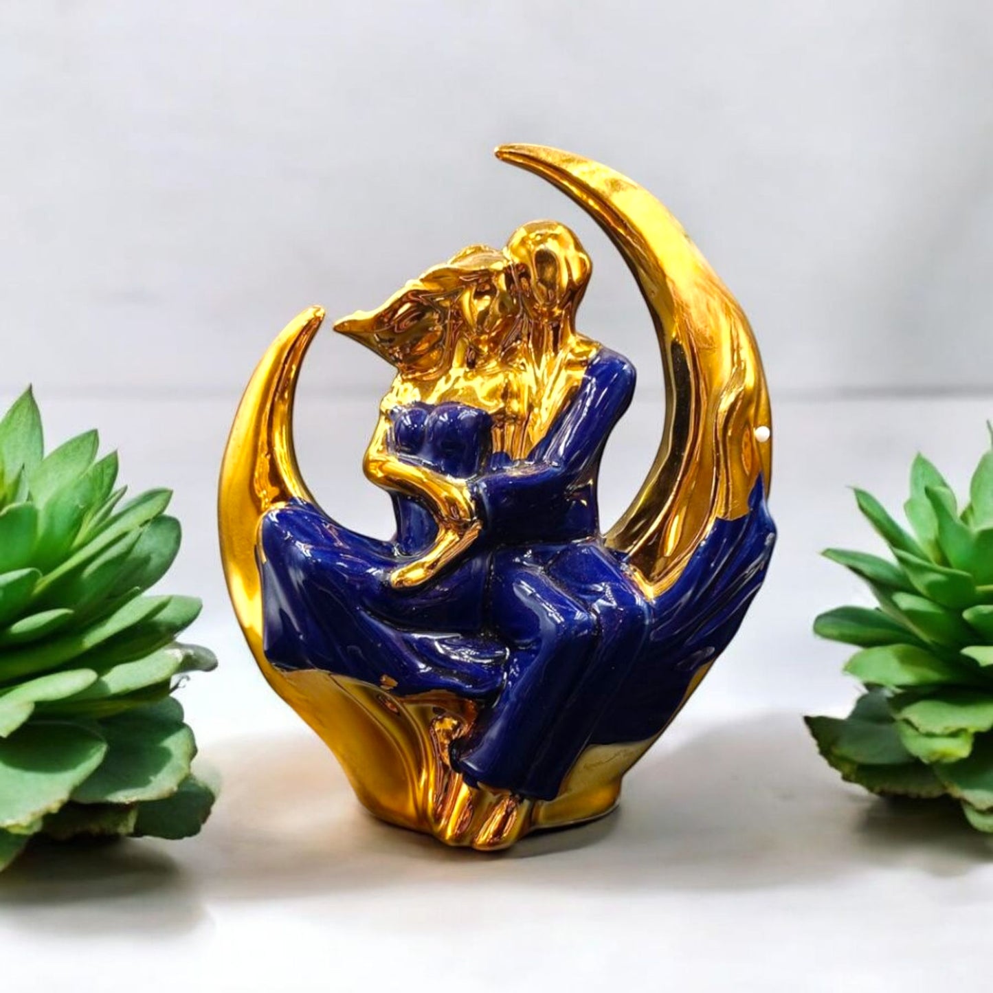 Romantic Couple on Crescent Moon Figurine