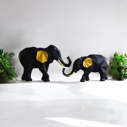 Black and Gold Elephant Figurines