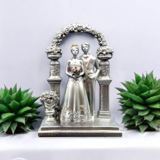 Silver Wedding Couple Figurine Under Floral Arch